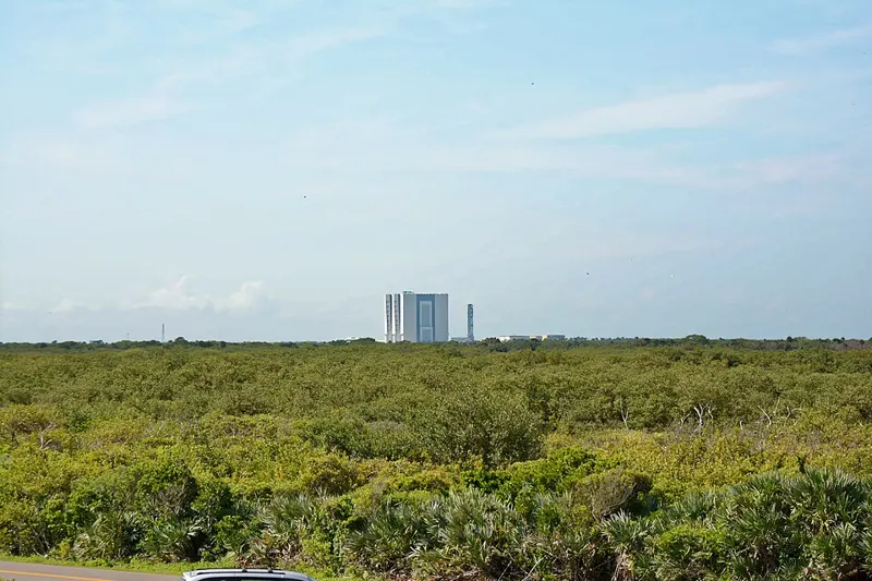 Playalinda Beach dunes with NASA's Vehicle Assembly Building on the horizon