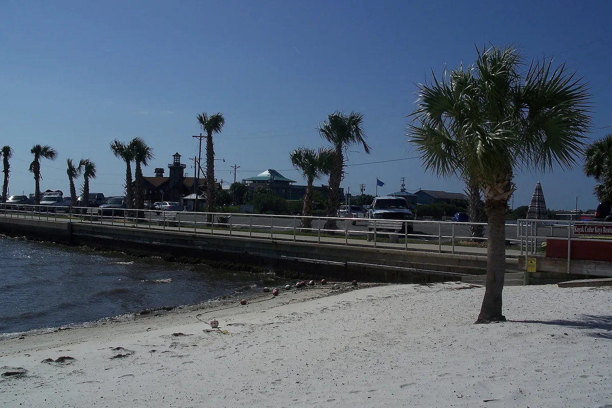 Wooden buildings on stilts along Dock Street over the water in Cedar Key